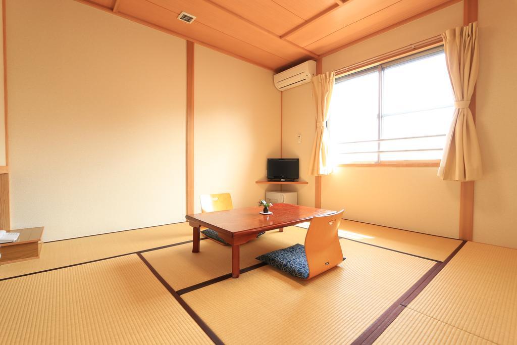 Отель Shinwakan Satsumasendai Номер фото